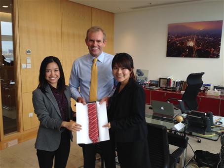 Cecilia and Ginger presenting Mark Hutchinson with a token of appreciation