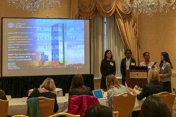 Students present at the Women in Investing Conference in Boston