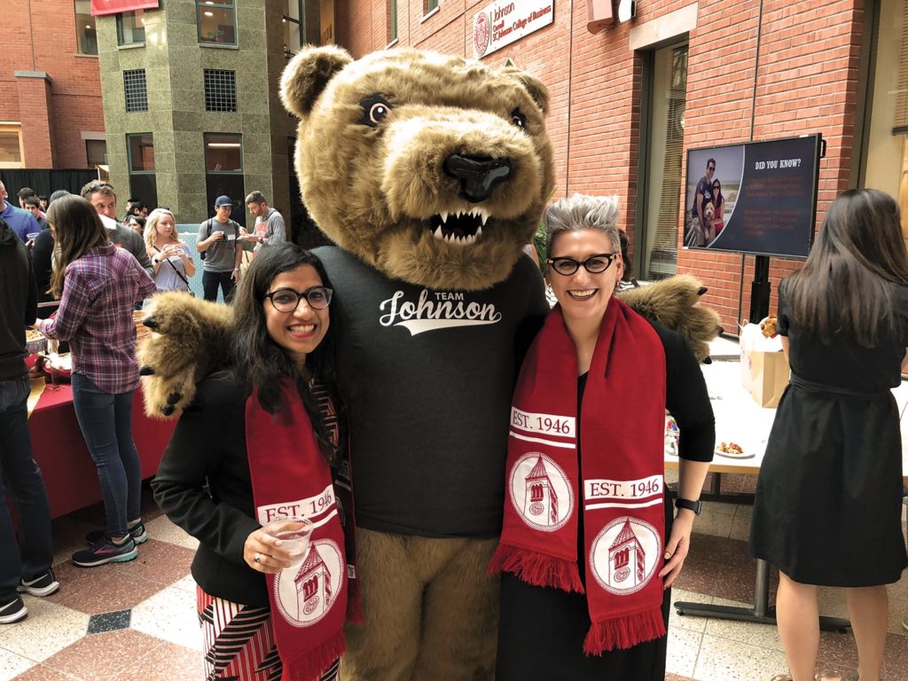 Johnson Students inside the Sage Hall Atrium.