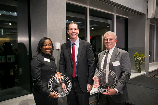 pictured left to right: Marmeline Petion-Midy '95, MBA ’00, Dean Mark Nelson, and Larry Ruff, MBA ’82