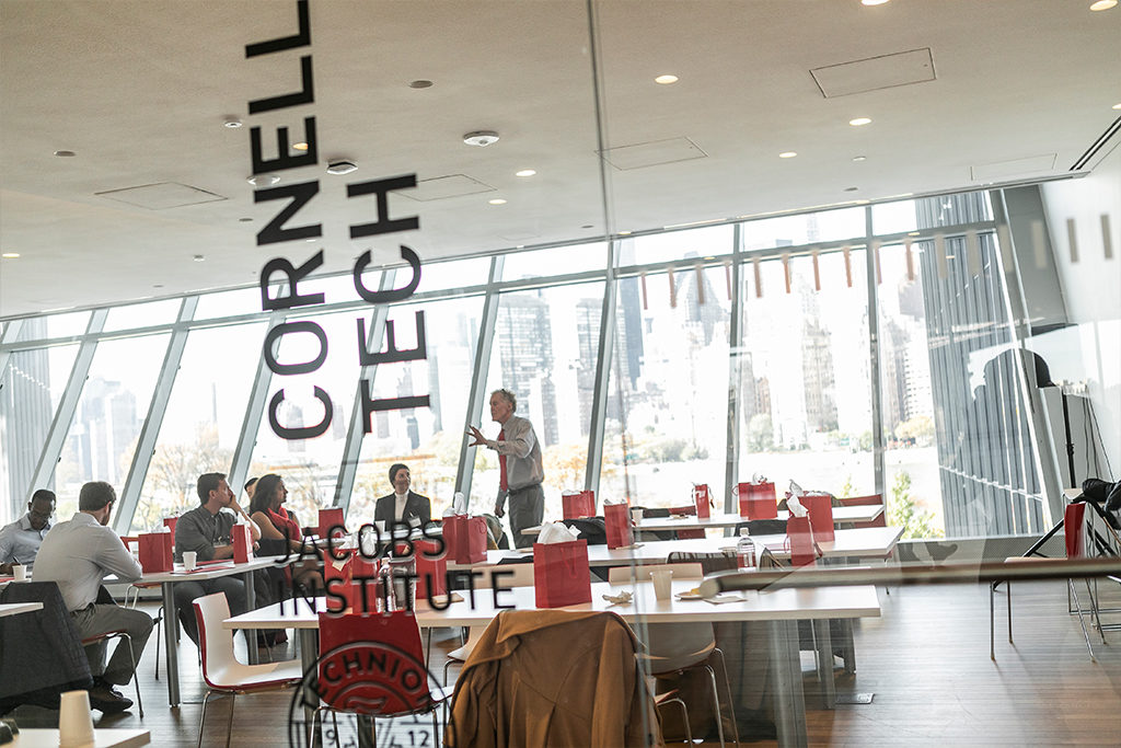 Students gathering in conversation at Cornell Tech