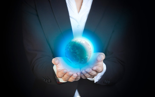 Globe in the hands of a businesswoman