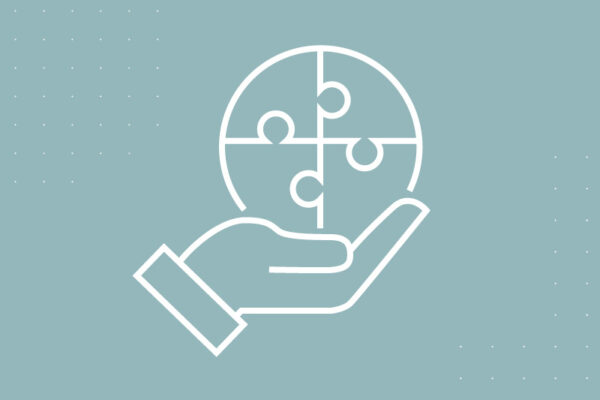 Icon of a hand holding a puzzle piece