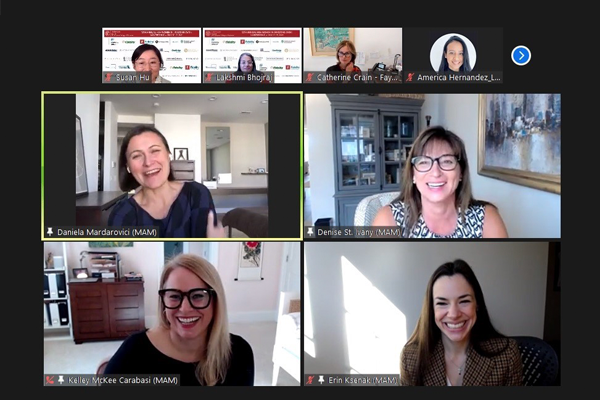 women smiling on a zoom call