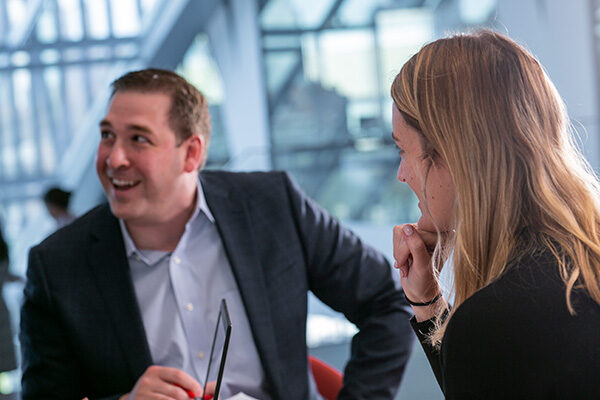 EMBA students in conversation.