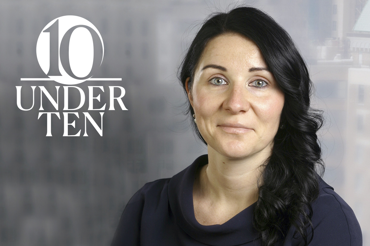 headshot of Olga Abrosimova Juin with the 10 Under 10 graphic identifier.