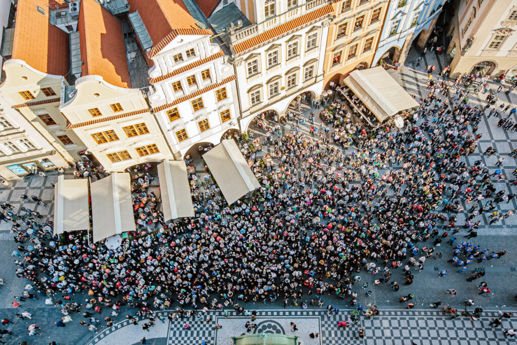 Crowd outside of buildings