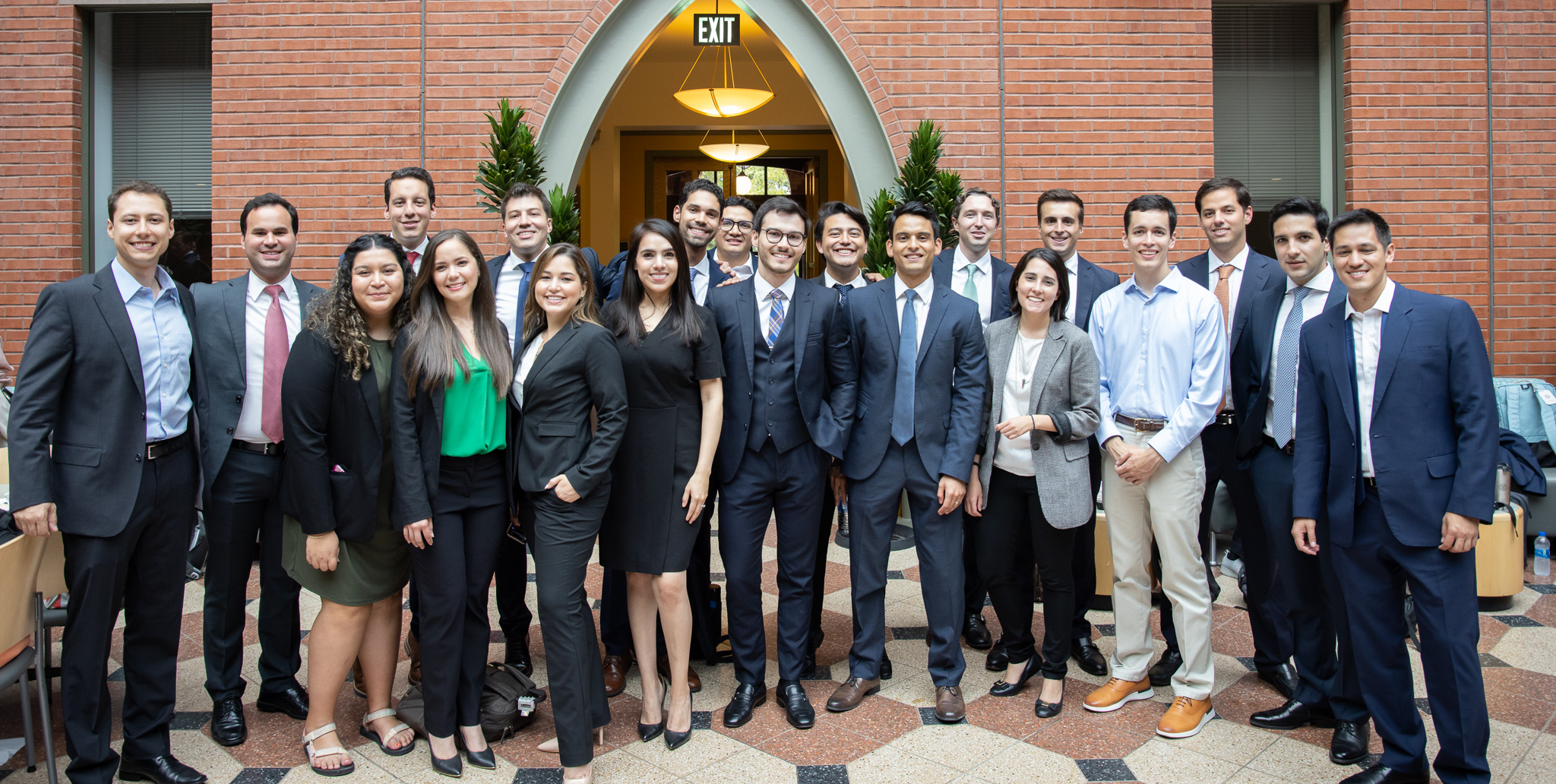 Group of Latinx people posing for a photo.