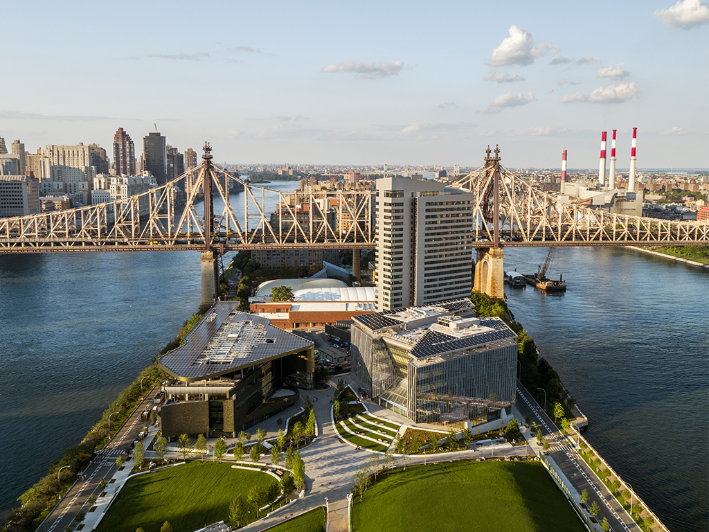 Aerial view of the Cornell Tech campus on Roosevelt Island surrounded by New York City.