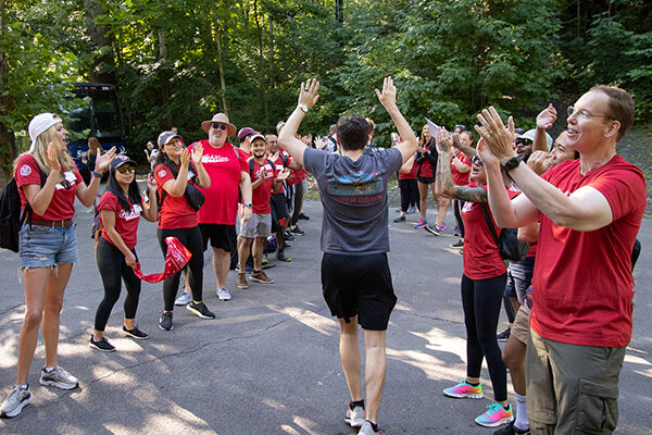 Johnson staff/faculty/volunteers welcome Johnson students to the Johnson Outdoor Experience.