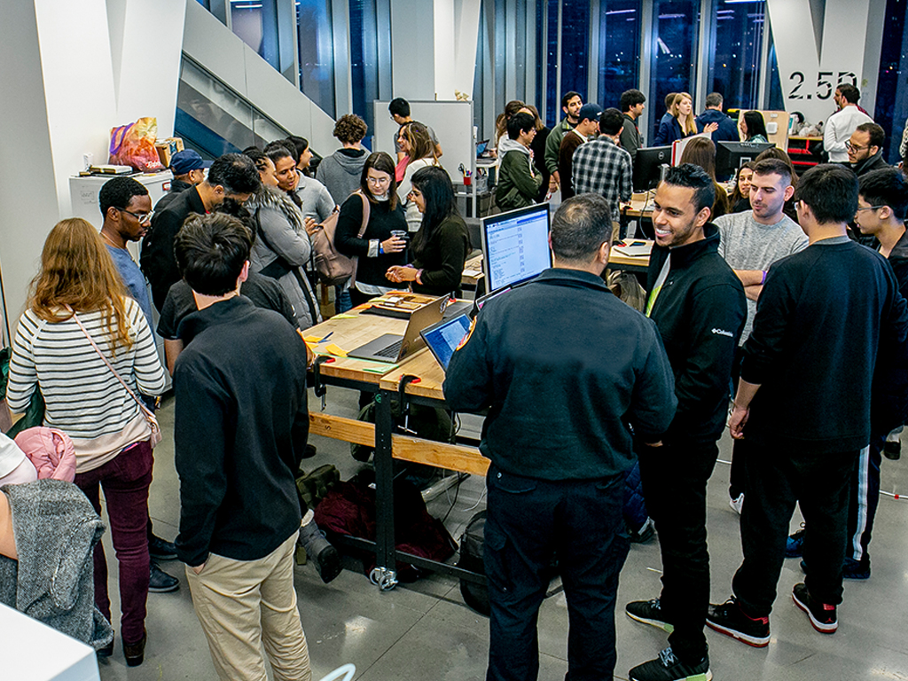 Cornell Tech students at an open Studio event.