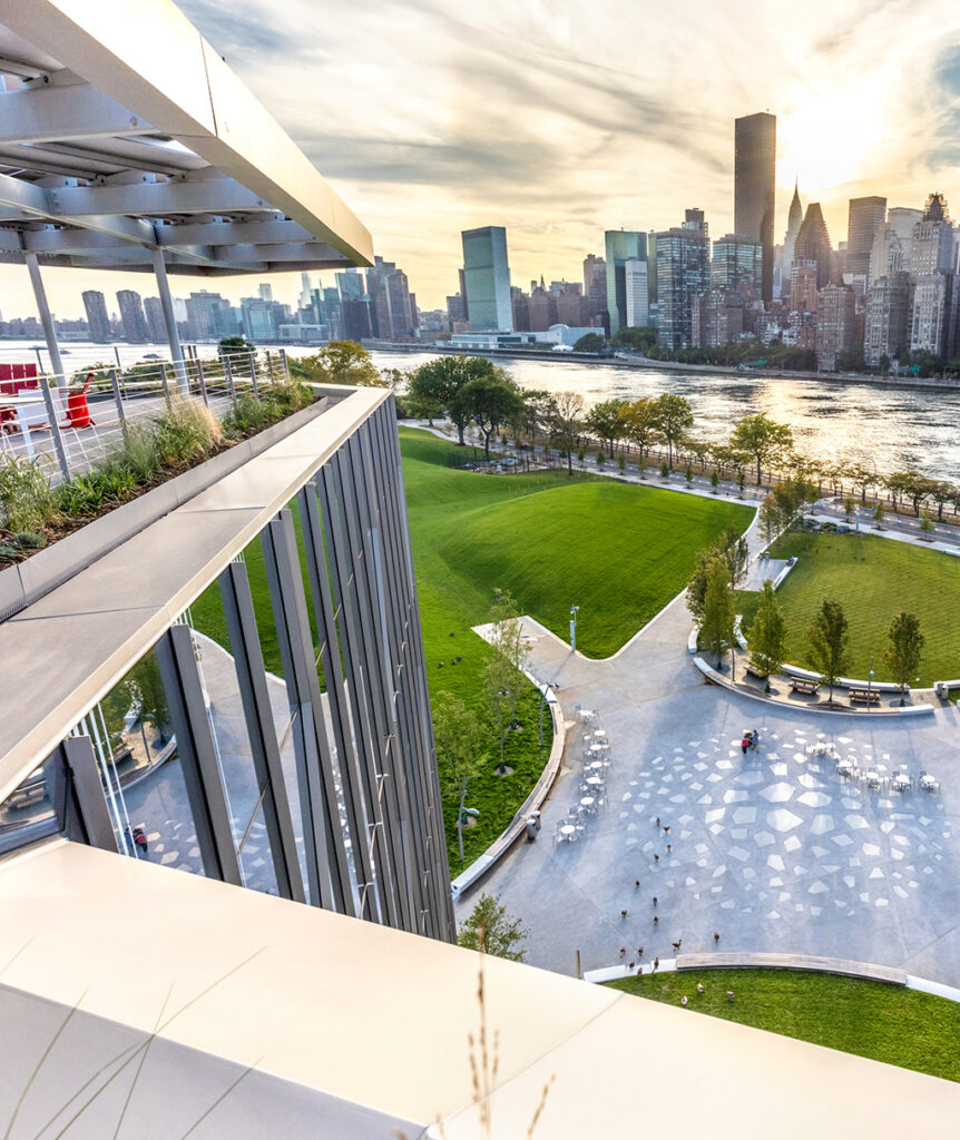 View of the Cornell Tech campus on Roosevelt Island, the river, and Manhattan in the distance
