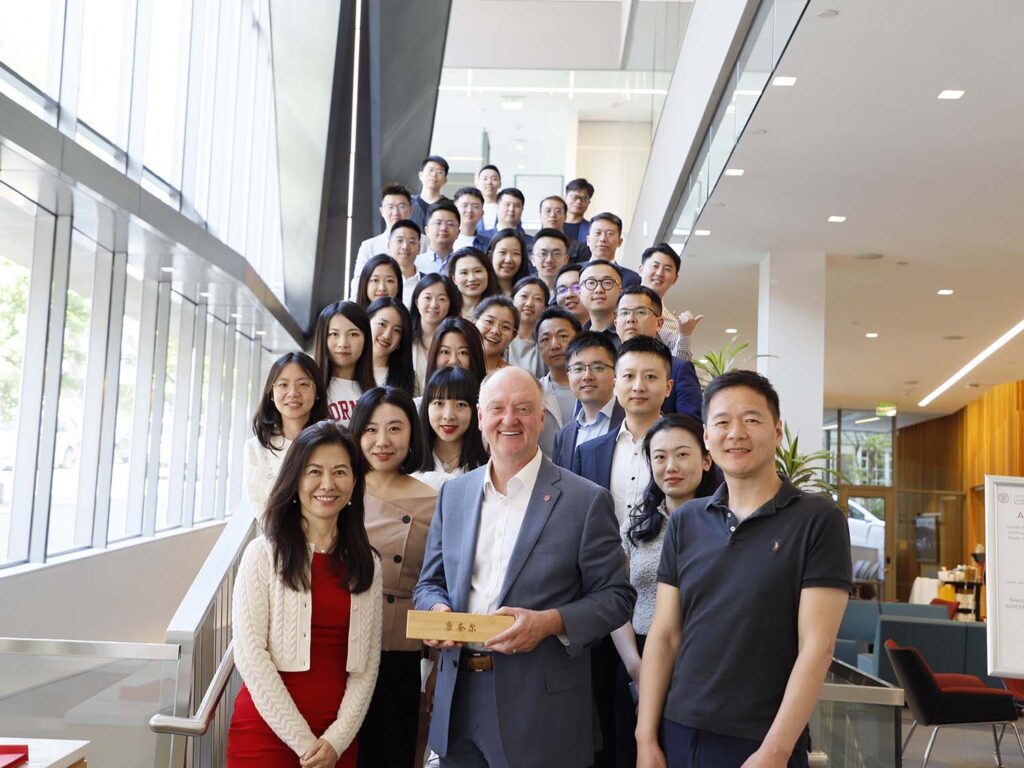 Photo of Dean Karolyi and Cornell-Tsinghua students