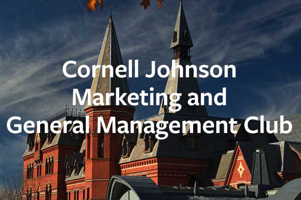 “Cornell Johnson Marketing and General Management Club” written over the exterior of Sage Hall.