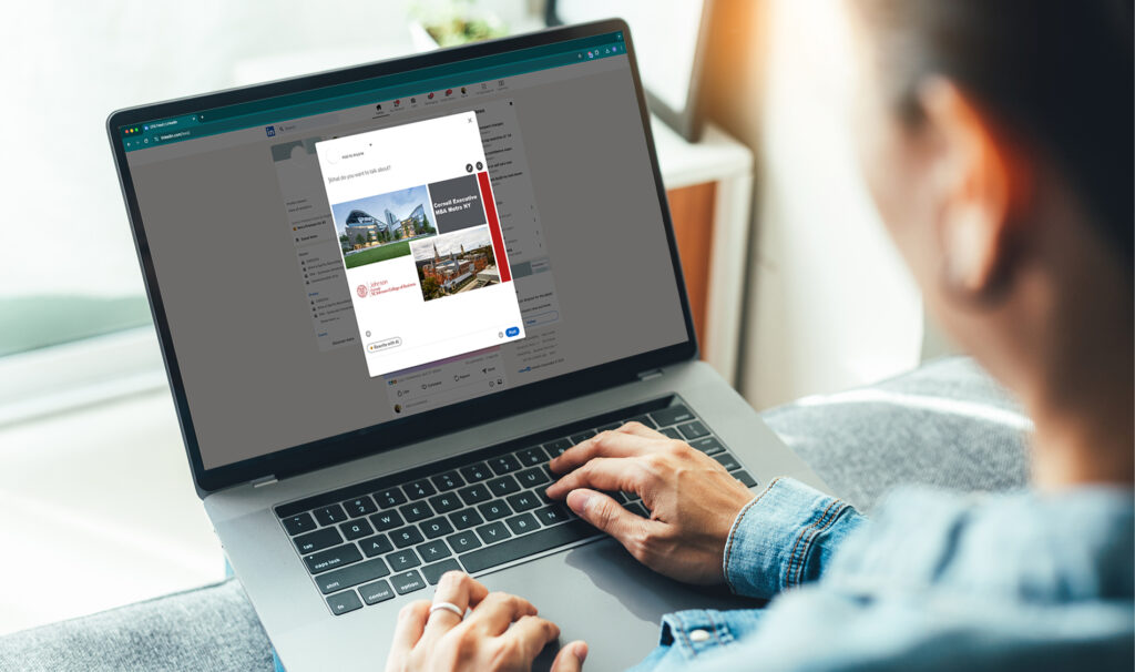 Person working on a laptop, sharing a post on LinkedIn.