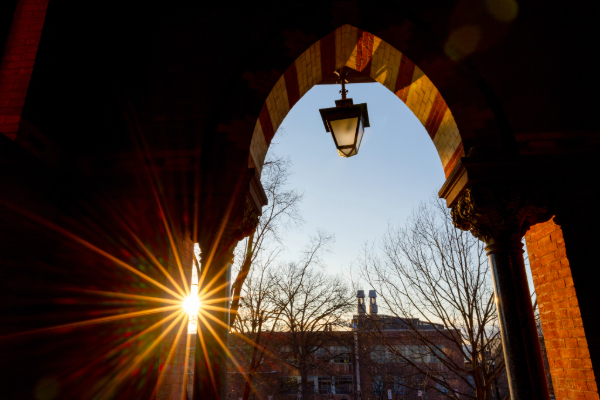 Looking out from Sage Hall with the sun peeking through the doorway.