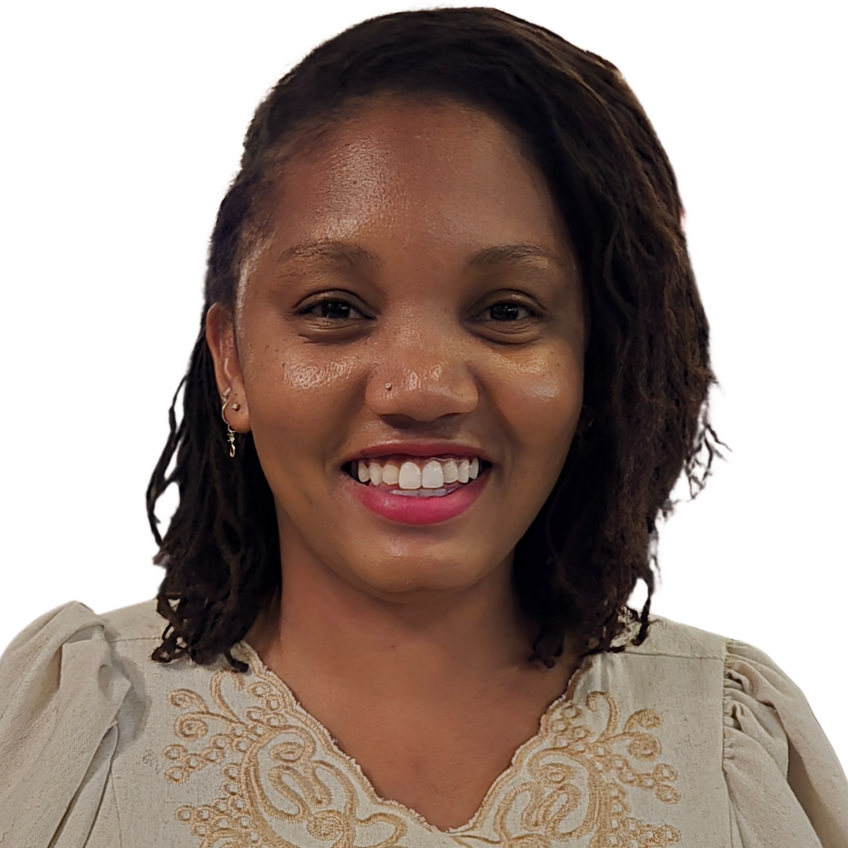 woman in business casual attire smiling at viewer