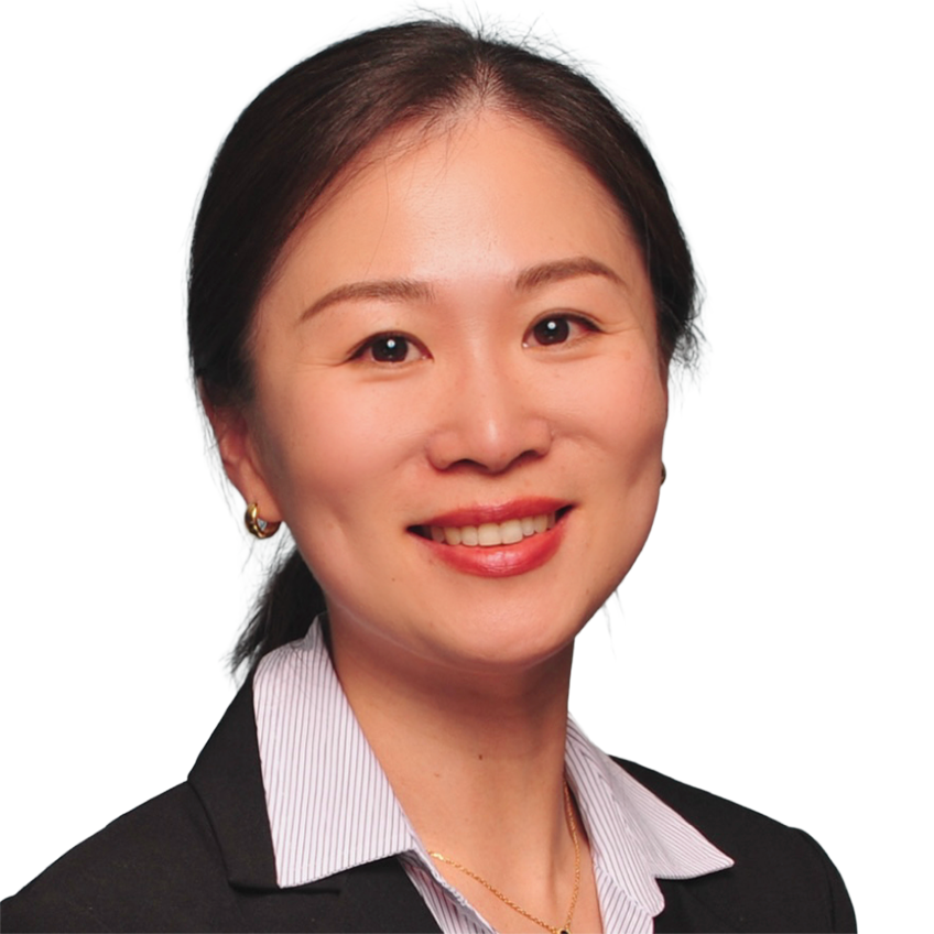 woman in business attire smiling at viewer