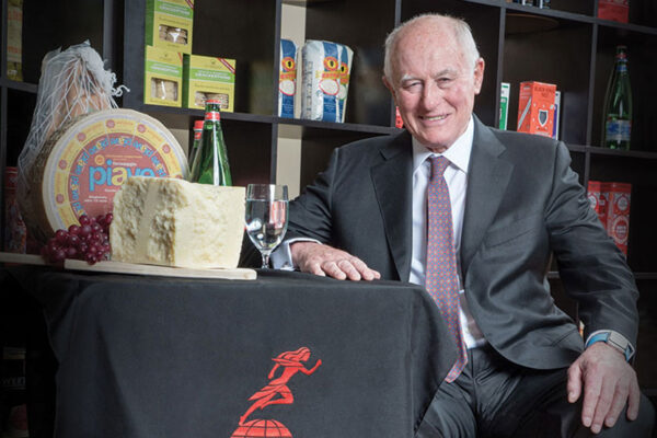 George Gellert poses with products from the Gellert Global Group.